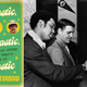 Oakland Outfielder Reggie Jackson, left, pulls the collar of his boss, club owner Charles Finley, right, with As Manager Dick Williams, center, watching, Oct. 2, 1971, Baltimore, Md. Jackson was remarking about Finleys bright green jacket as they waited out a rainy day at a Baltimore hotel. (Photo credit: Bob Daugherty/AP)